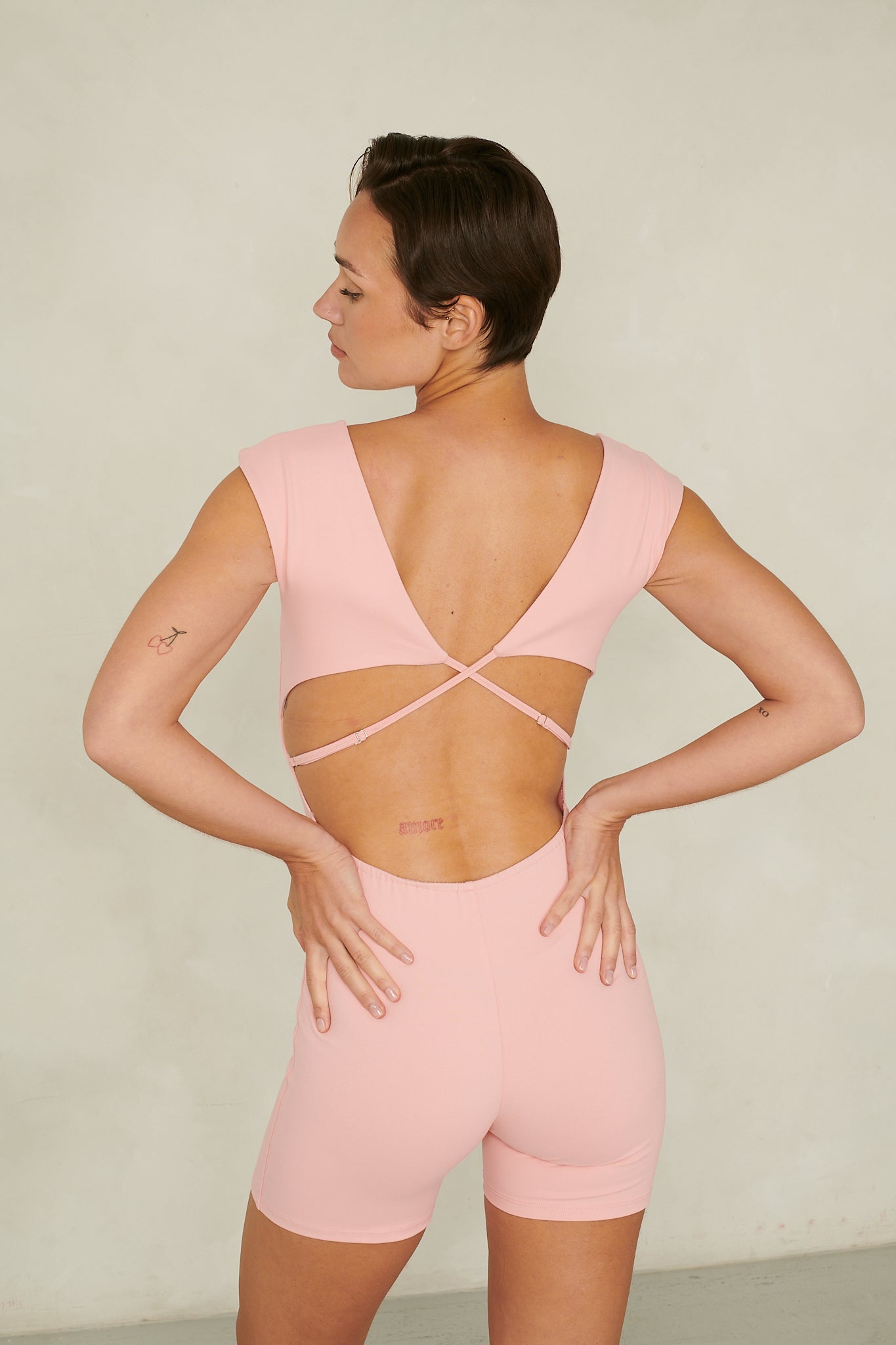PINK OPEN-BACK PADDED JUMPSUIT
